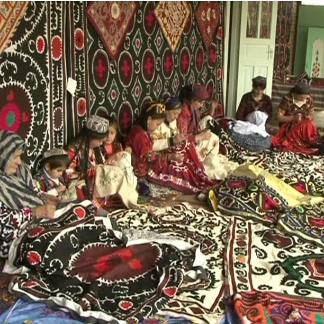 Women of Urgut embroidering suzani together